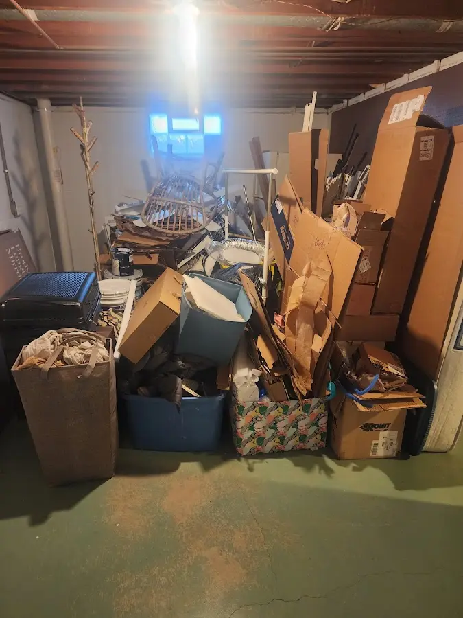 Roll-off dumpster container at job site for Concrete Dumpster Rental in Burlington